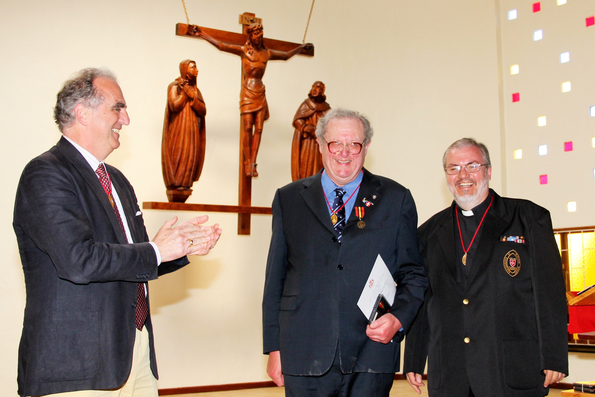 Frà Matthew Festing wearing the Brotherhood's twentieth-anniversary commemorative medal beside Father Gérard