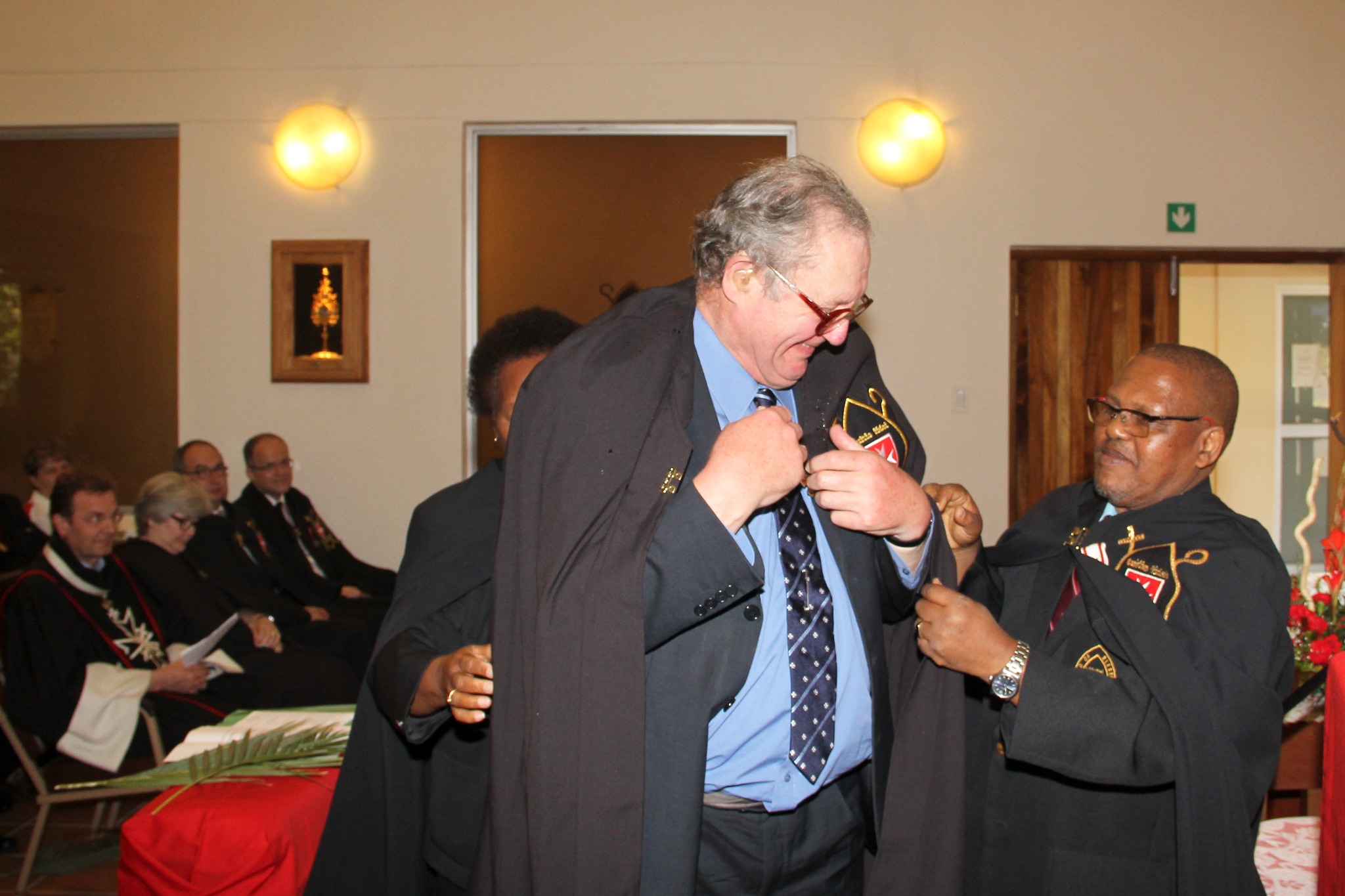 Frà Matthew Festing being vested during his admission as an Honorary Dedicated Member