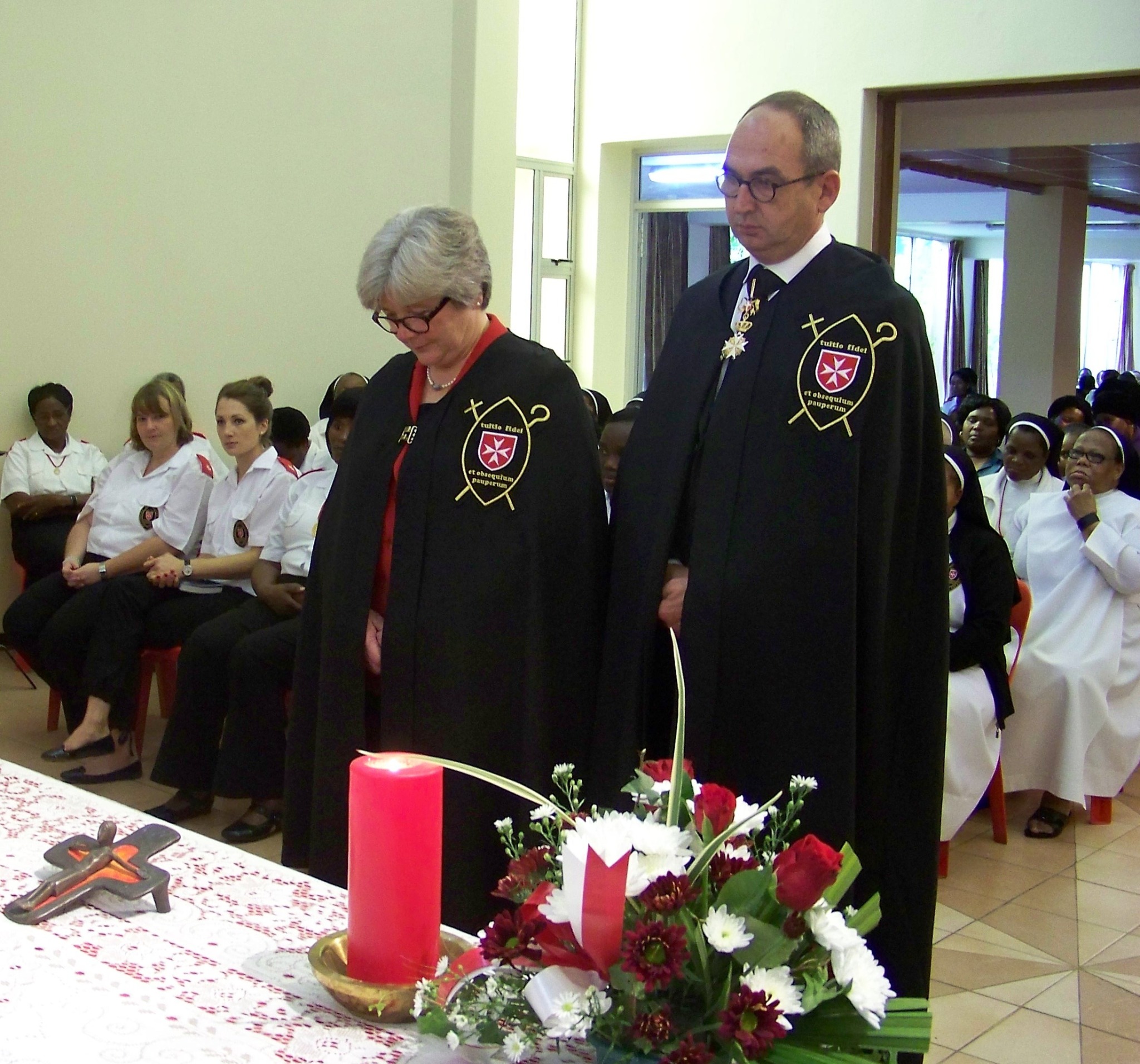 Maria Theresia and Hans Peter Rehder wearing the Brotherhood's cape on 28 October 2012