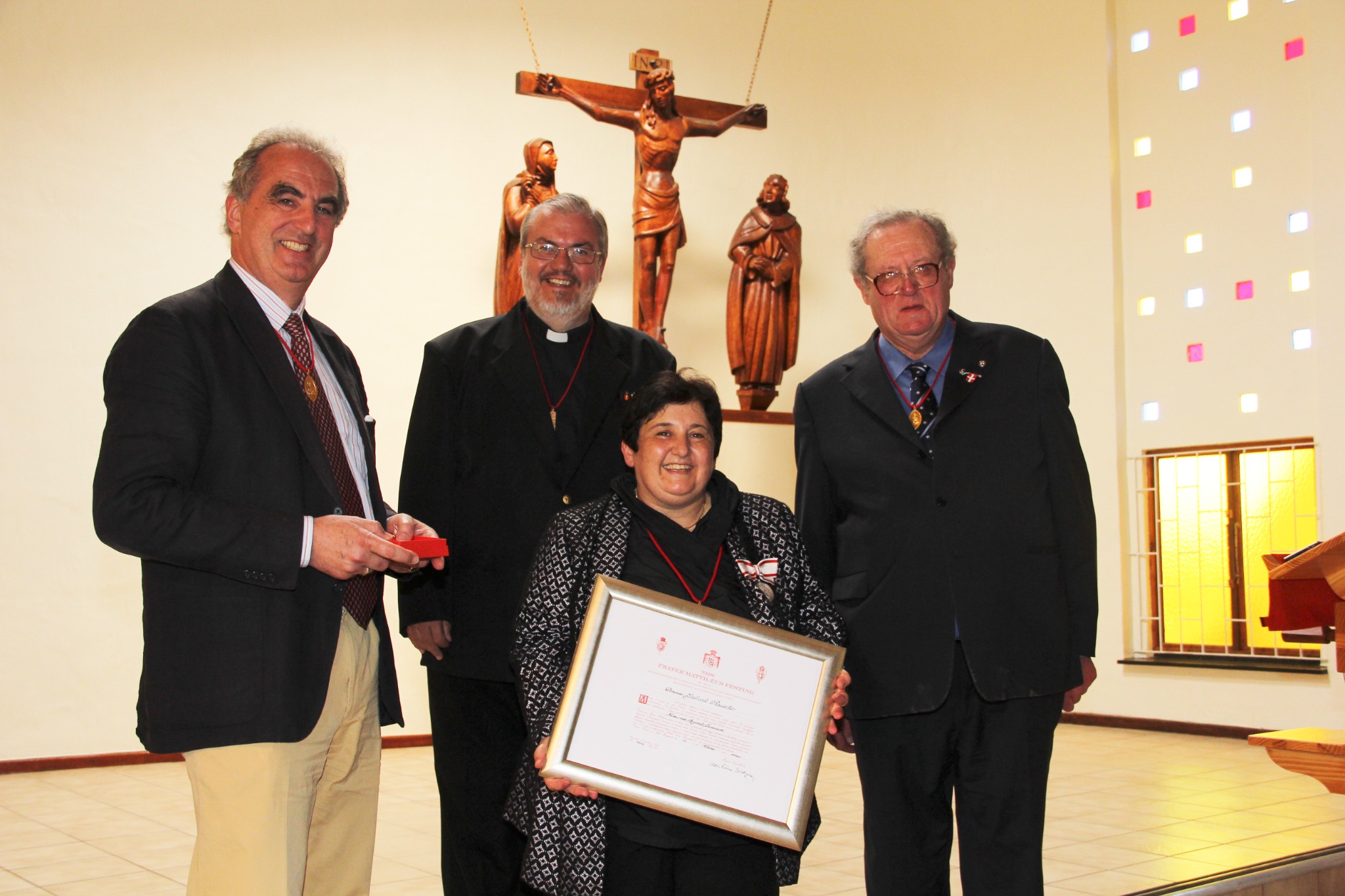 Gabriele Rauecker with the Silver Medal pro Merito Melitensi and certificate